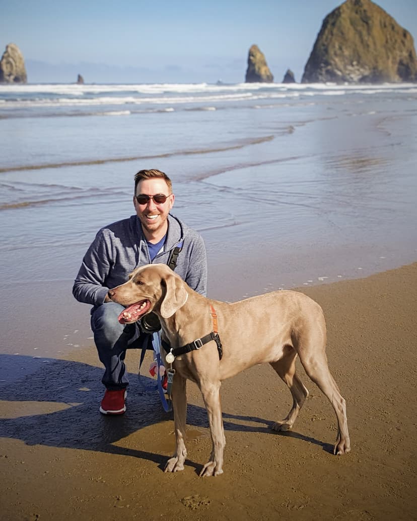 Nick with his dog Sam at Cannon Beach